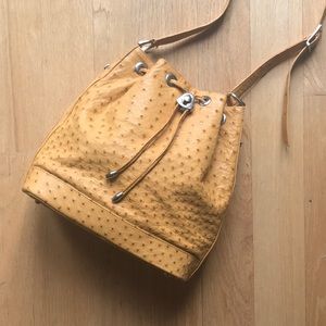Genuine ostrich skin burnt yellow barrel bag